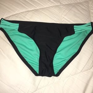 Teal and black target swimsuit bottoms